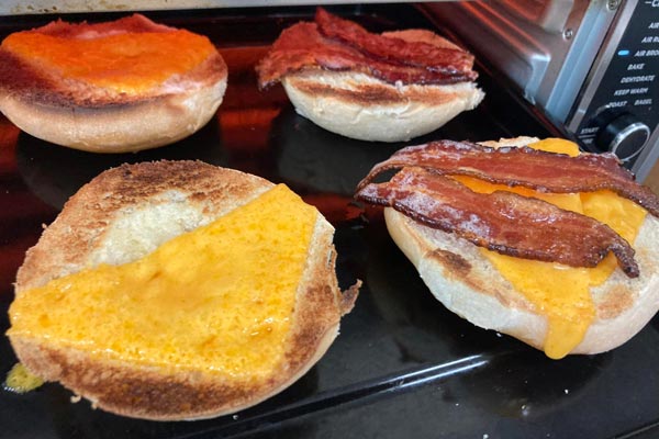 breakfast sandwiches being toasted